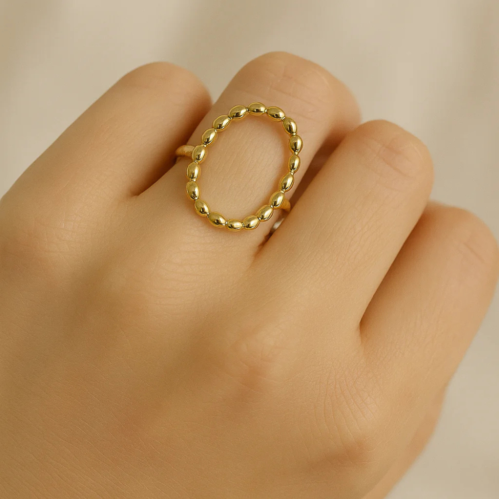 Anello dorato con cerchio traforato - Nido