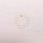 Bracciale dorato a cerchi intrecciati – Aria