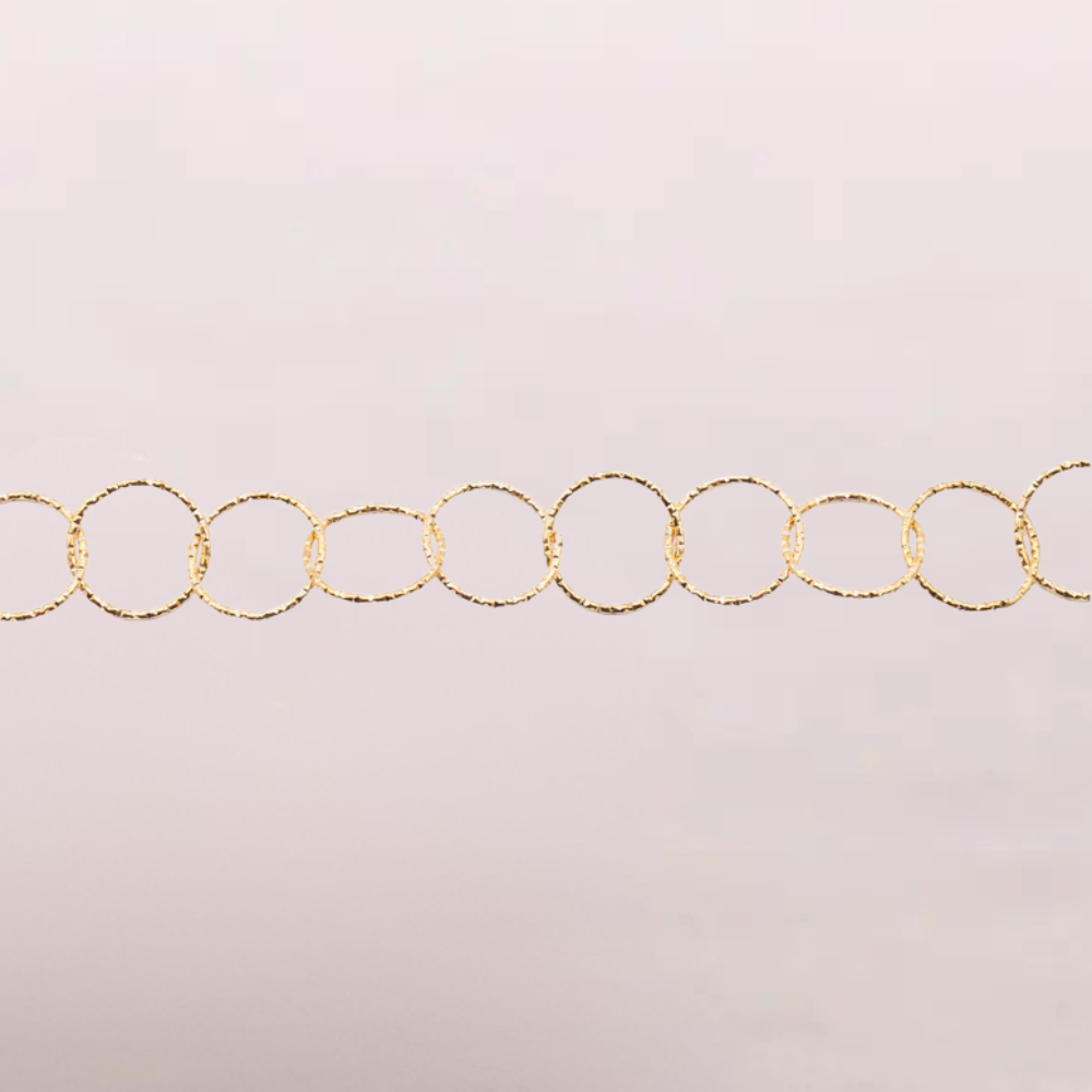 Bracciale dorato a cerchi intrecciati – Aria