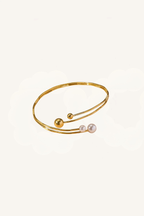 Bracciale aperto con perle e sfere – Bracciale Lyra