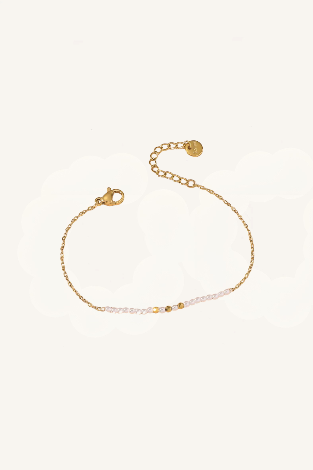 Set di bracciali dorati e perle – Set Luminosa