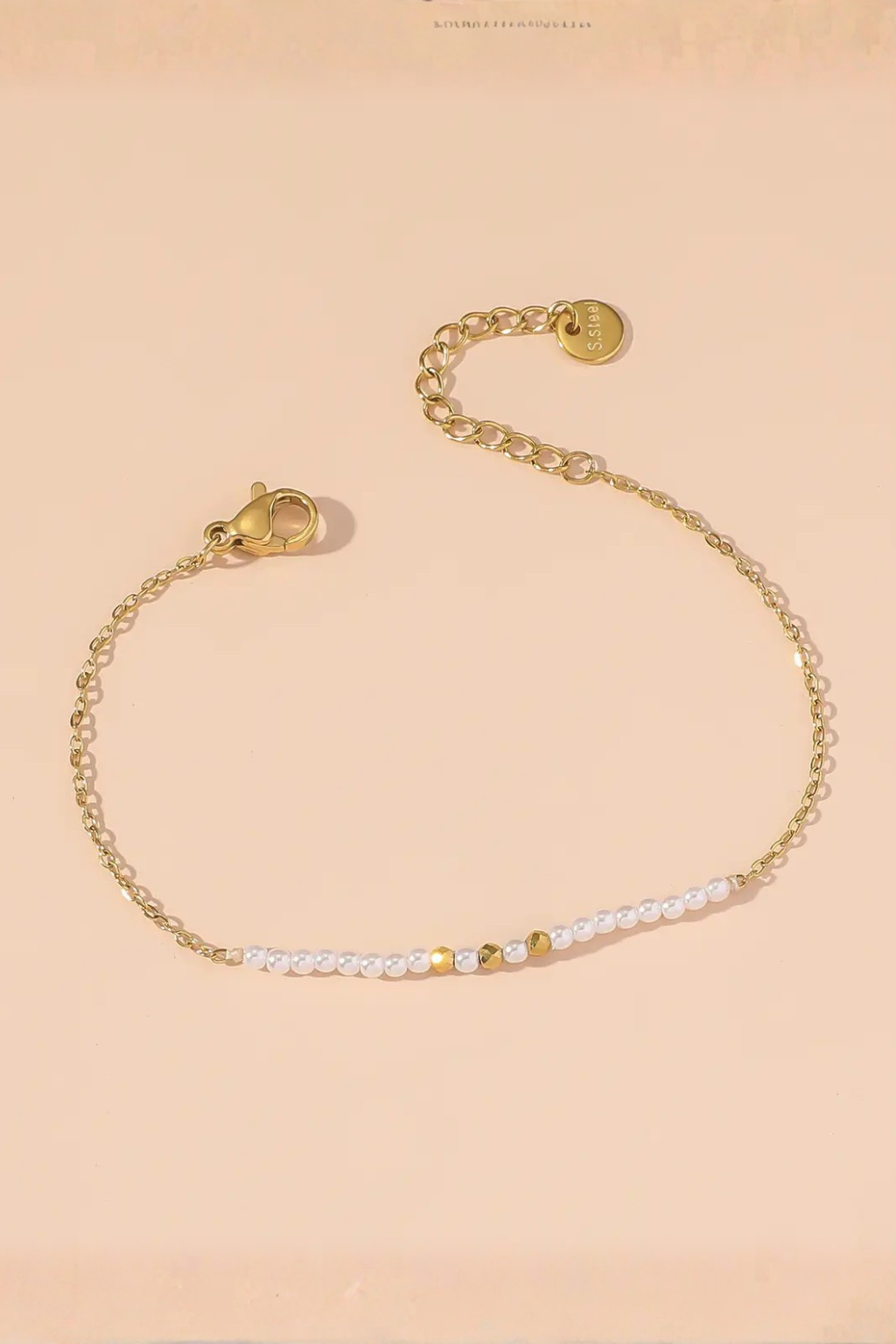 Set di bracciali dorati e perle – Set Luminosa