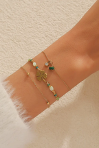 Set di bracciali dorati con ciondoli verdi – Set Lucky Charm
