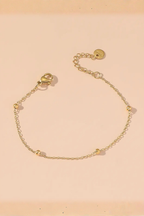 Set di bracciali dorati con ciondoli verdi – Set Lucky Charm