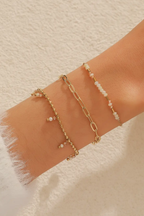 Set di bracciali dorati con perline – Set Golden Light