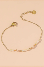 Set di bracciali dorati con perline – Set Golden Light