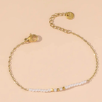 Set di bracciali dorati e perle – Set Luminosa
