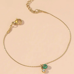 Set di bracciali dorati con ciondoli verdi – Set Lucky Charm