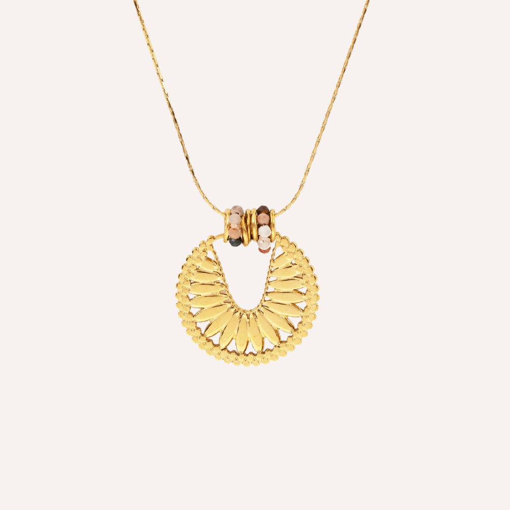 Collana con pendente dorato e dettagli in pietra – Rayo
